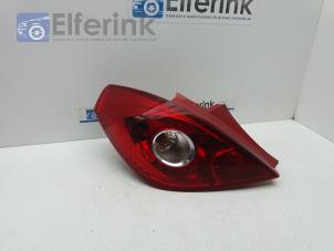 Used Taillight, left Opel Corsa D 1.4 16V Twinport Price € 20,00 Margin scheme offered by Auto Demontage Elferink B.V.