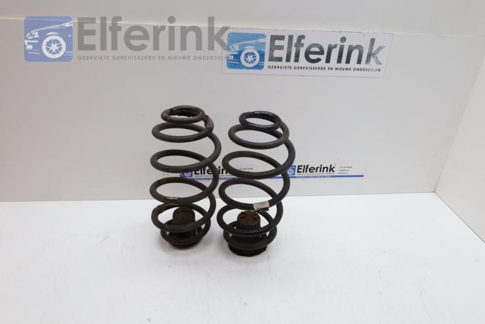 Rear coil spring from a Saab 9-3 Sport Estate (YS3F) 2.0t 16V 2010