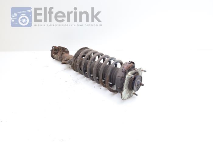 Front shock absorber rod, left from a Volvo 850 2.5i GLE 10V 1995
