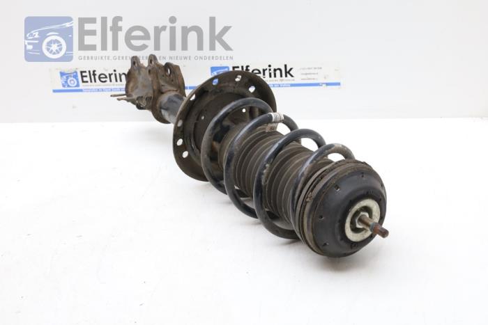 Front shock absorber rod, right from a Opel Corsa D 1.4 16V Twinport 2009