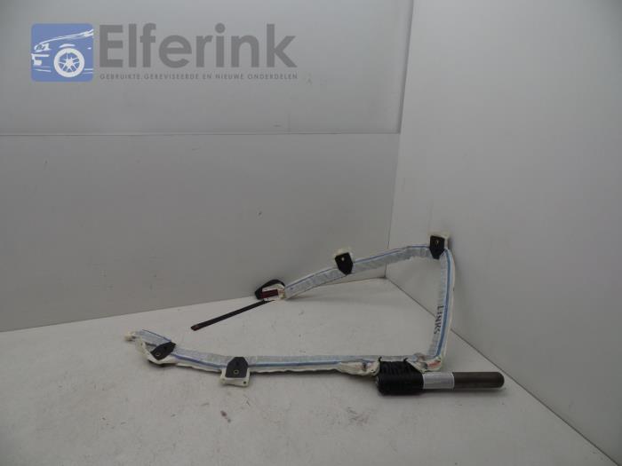 Roof curtain airbag, left from a Opel Corsa D 1.3 CDTi 16V ecoFLEX 2010