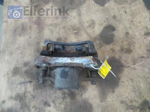 Used Front brake calliper, left Saab 9-5 (YS3G) 2.0 TiD 16V Price € 75,00 Margin scheme offered by Auto Demontage Elferink B.V.