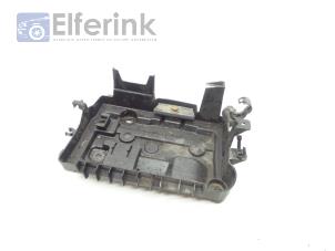 Used Battery box Opel Corsa D 1.4 16V Twinport Price € 25,00 Margin scheme offered by Auto Demontage Elferink B.V.