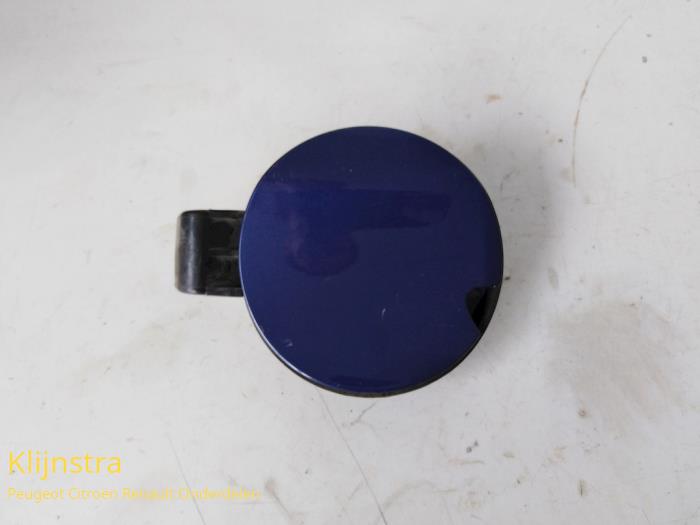 Tank cap cover from a Peugeot 208 2013