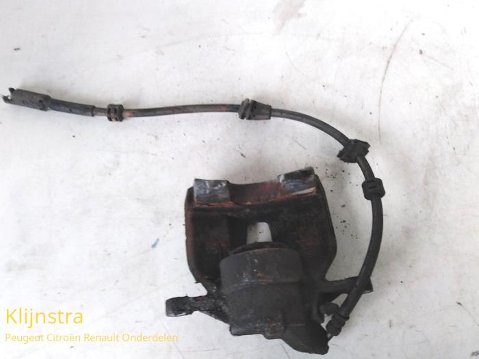 Front brake calliper, left from a Peugeot 308 2014