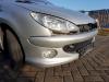 Front bumper from a Peugeot 206 (2A/C/H/J/S) 1.6 HDi 16V 2004