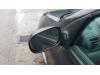 Außenspiegel links van een Renault Clio II (BB/CB) 1.4 1999