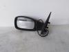 Wing mirror, left from a Peugeot 306 (7D), Convertible, 1993 / 2003 1994