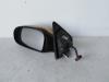 Wing mirror, left from a Citroën Saxo  1999