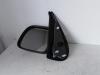 Wing mirror, left from a Renault Kangoo 1997