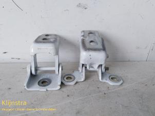 Used Front door hinge, left Renault Clio Price on request offered by Fa. Klijnstra & Zn. VOF