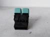 Fog light switch from a Renault Twingo (C06) 1.2 16V 2005