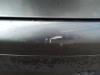 Stoßstange hinten van een Peugeot 206 CC (2D) 1.6 HDI 16V FAP 2006