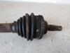Front drive shaft, left from a Peugeot 206 (2A/C/H/J/S) 2.0 XS,XT HDi 2000