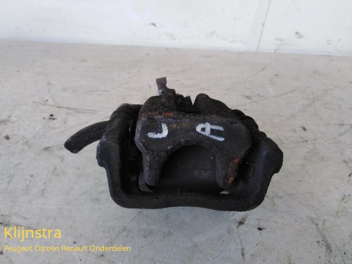 Rear brake calliper, left from a Renault Kangoo Express (FW) 1.5 dCi 75 2012