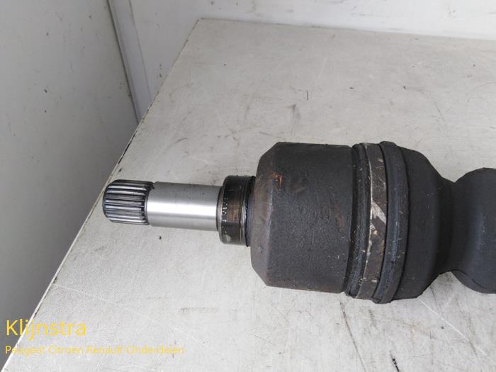 Front drive shaft, left from a Citroën Xsara Picasso (CH) 1.8 16V 2002