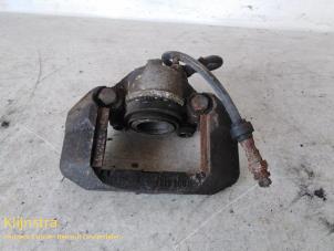 Used Front brake calliper, left Peugeot 205 II (20A/C) 1.4 GR, XR Price on request offered by Fa. Klijnstra & Zn. VOF