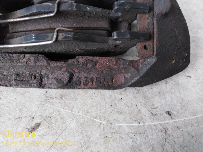 Rear brake calliper, left from a Peugeot 306 (7B) 1.8i 16V 1997