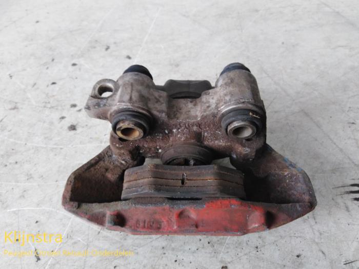 Rear brake calliper, left from a Peugeot 106 I 1.1 XN,XR,XT 1992