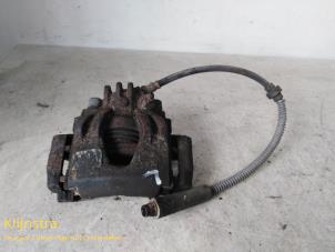 Used Front brake calliper, left Peugeot 306 (7A/C/S) 1.4 Kat. Price on request offered by Fa. Klijnstra & Zn. VOF