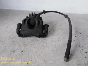 Used Front brake calliper, left Peugeot 306 (7B) 1.4 SL,SR Kat. Price on request offered by Fa. Klijnstra & Zn. VOF
