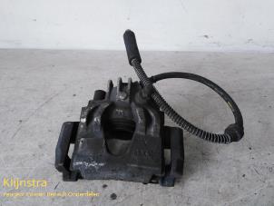 Used Front brake calliper, left Peugeot 306 (7A/C/S) 1.9 D Kat. Price on request offered by Fa. Klijnstra & Zn. VOF