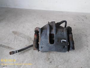 Used Front brake calliper, left Citroen Xsara Picasso (CH) 1.6 Price on request offered by Fa. Klijnstra & Zn. VOF