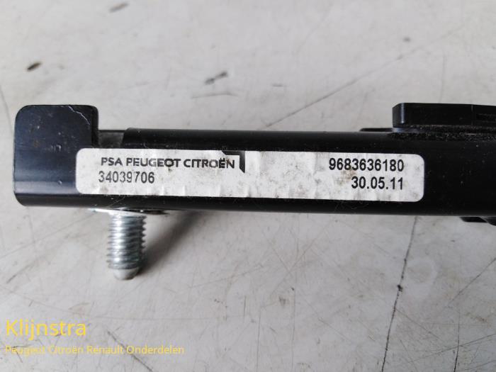 Seatbelt guide from a Peugeot 3008 2011