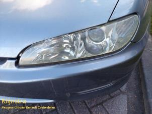 Used Headlight, left Peugeot 406 Coupé (8C) 2.0 16V Price on request offered by Fa. Klijnstra & Zn. VOF