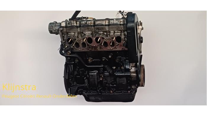 Engine from a Peugeot 306 Break (7E) 1.9 DT 1998
