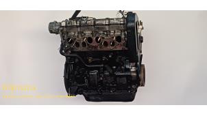 Engine from a Peugeot 306 Break (7E) 1.9 DT 1998