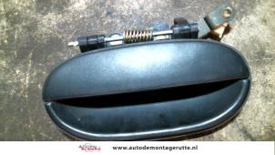Used Door handle 2-door, left Hyundai Accent Price on request offered by Autodemontage M.J. Rutte B.V.
