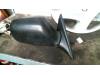 Wing mirror, right from a Daihatsu Applause 1995