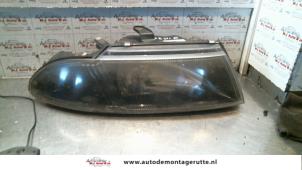 Used Headlight, right Mitsubishi Carisma 1.6i 16V Price on request offered by Autodemontage M.J. Rutte B.V.