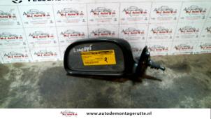 Used Wing mirror, left Mitsubishi Colt (CA/CC) 1.3 i GL,EL 12V Price on request offered by Autodemontage M.J. Rutte B.V.