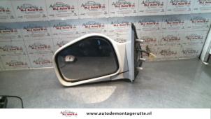 Used Wing mirror, left Ssang Yong Musso 2.9D Price on request offered by Autodemontage M.J. Rutte B.V.