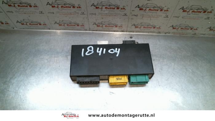 Computer lighting module from a BMW 3 serie (E36/2C) 325i 24V 1993