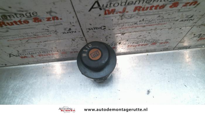 Rear window heating switch from a Opel Kadett E (33/34/43/44) 1.3 N,L,LS,GL,GLS 1989