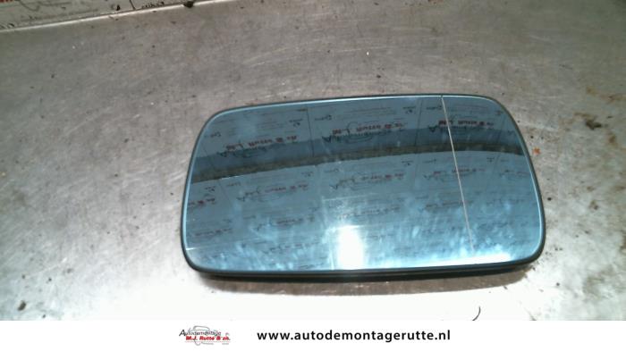 Mirror glass, left from a BMW 3 serie (E46/4) 320d 16V 1999