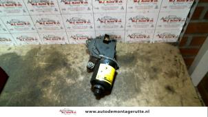 Used Front wiper motor Mazda 323 P (BA15) 1.3i 16V Price on request offered by Autodemontage M.J. Rutte B.V.