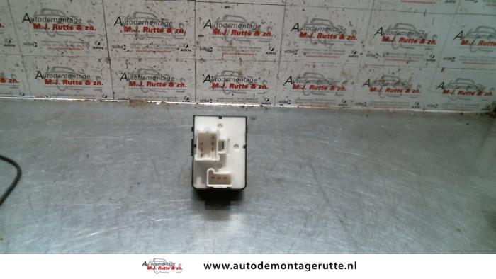 Multi-functional window switch from a Opel Sintra 2.2i GLS,CD 16V 1998