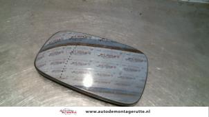 Used Mirror glass, left Renault Grand Scénic II (JM) 2.0 16V Price on request offered by Autodemontage M.J. Rutte B.V.