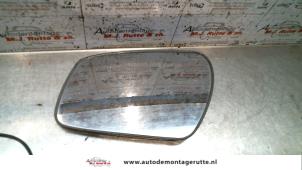 Used Mirror glass, left Ford Focus C-Max 1.8 16V Price on request offered by Autodemontage M.J. Rutte B.V.