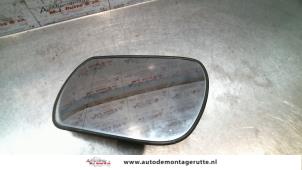 Used Mirror glass, left Mazda 6 Sport (GG14) 2.0 CiDT HP 16V Price on request offered by Autodemontage M.J. Rutte B.V.