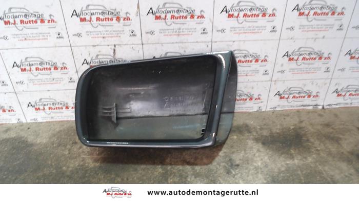 Mirror housing, left from a Mercedes-Benz C (W202) 1.8 C-180 16V 1996