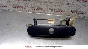 Used Tailgate handle Volkswagen Polo IV (9N1/2/3) 1.4 16V 75 Price on request offered by Autodemontage M.J. Rutte B.V.