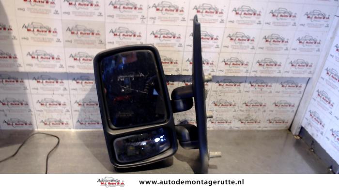 Wing mirror, left from a Opel Movano Combi 2.2 DTI 2003
