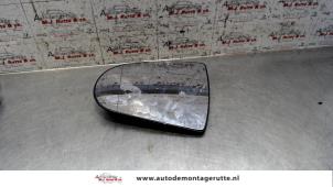 Used Mirror glass, left Mitsubishi Colt (Z2/Z3) 1.3 16V Price on request offered by Autodemontage M.J. Rutte B.V.