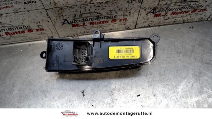 Fog light switch from a Fiat Bravo (198A) 1.4 16V 2007