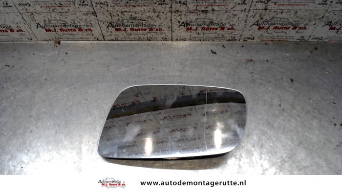 Mirror glass, left from a Seat Toledo (1M2) 1.6 2000